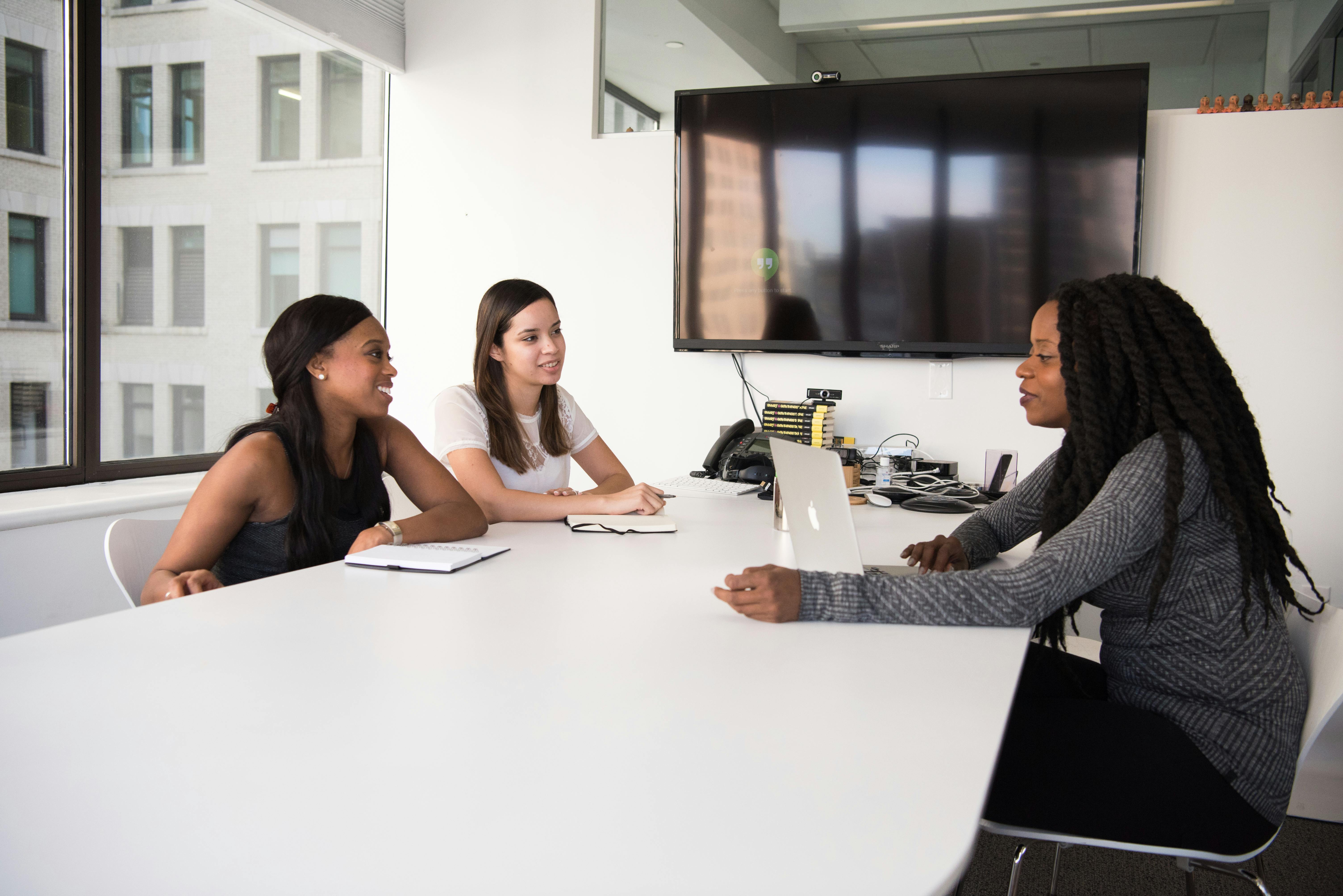 Professional women having a strategic HR meeting in modern office